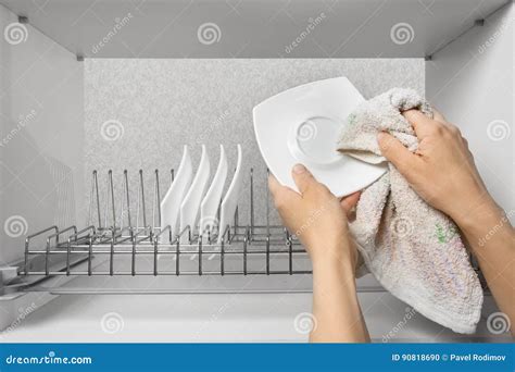 Hands Wiping Clean Plate with Towel Stock Photo - Image of kitchenware ...
