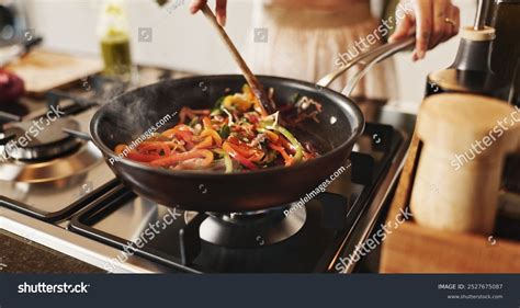 Person Cooking Pan Stir Fry On Stock Photo 2527675087 | Shutterstock