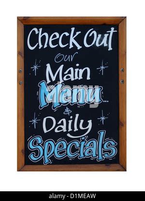 Writing the daily specials menu on the blackboard at The Treehouse ...