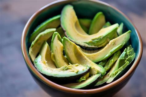 Fresh Avocado Slices in a Bowl, Ready To Eat. Healthy Vegan Food ...