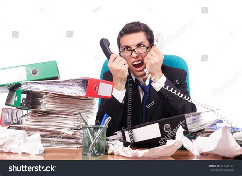 Young Busy Businessman At His Desk Stock Photo 127046183 : Shutterstock