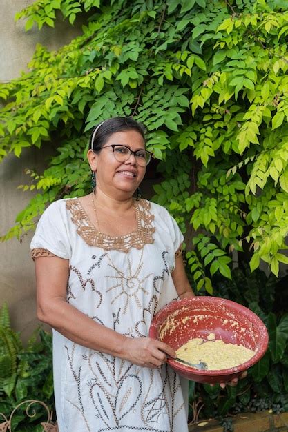 Premium Photo | Older Woman Preparing Traditional Food