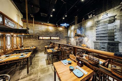 Rustic Restaurant Interior with Wooden Tables and Murals