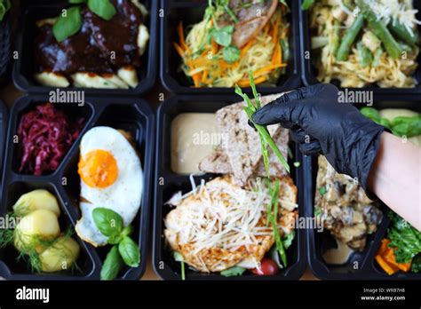 Meal prep. Appetizing lunch boxes. A balanced healthy diet Stock Photo ...