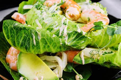 Premium Photo | Fresh green salad with shrimp and avocado