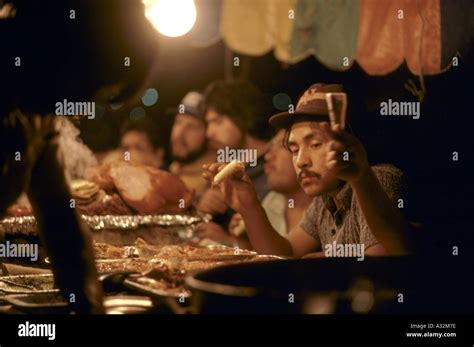 customers at busy street food stall in evening mexico city Stock Photo ...