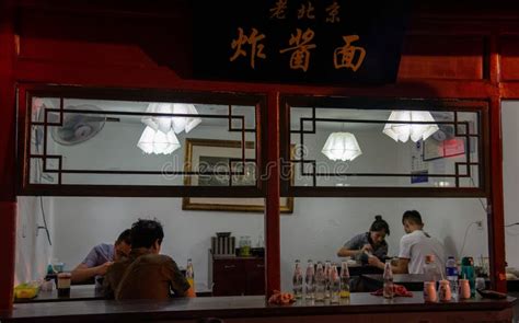 Chinese People Eating at a Traditional Restaurant. Asian Food Editorial ...