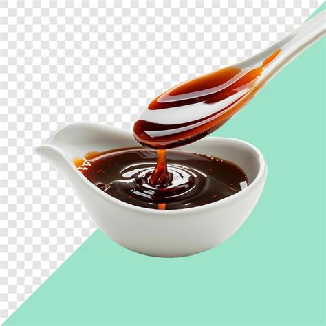 Premium PSD | A spoon with sauce dripping over a bowl of sauce