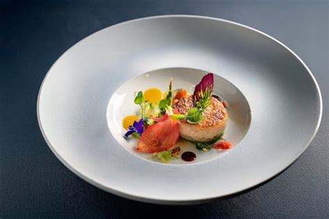 A Beautifully Plated Gourmet Dish Stock Photo - Image of fish, yellow ...