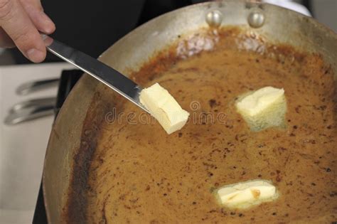 Adding the Butter To the Black Pepper Sauce Stock Photo - Image of ...