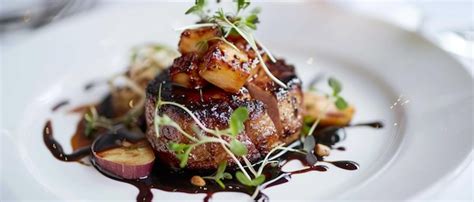 Gourmet_dishes_beautifully_plated | Premium AI-generated image