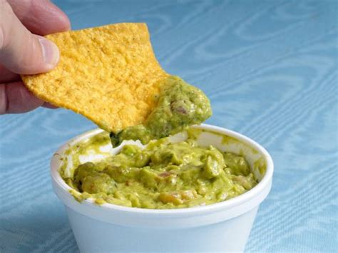 3,800+ Chip Dipping Stock Photos, Pictures &amp; Royalty-Free Images - iStock