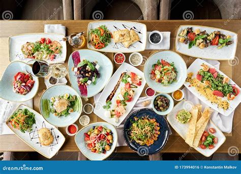 Many Different Delicious Dishes Dishes on the Table. Various Snacks and ...
