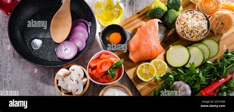 Fresh food ingredients prepared for cooking on a kitchen table Stock ...