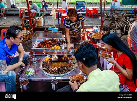 Young People Eating Street Food, Yangon, Myanmar Stock Photo - Alamy