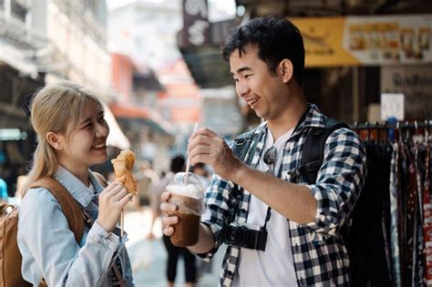Culinary Travel Adventure Enjoying Local Treats in a Vibrant Market ...