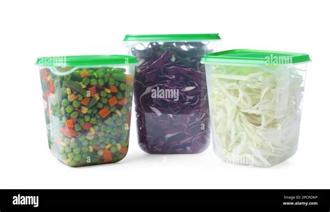 Fresh vegetables in plastic containers on white background Stock Photo ...