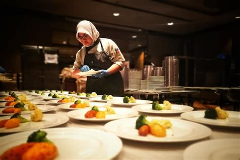 Premium Photo | Woman arranging food on table in restaurant