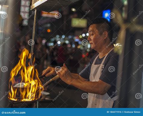 Fire cooking street food editorial photo. Image of street - 184471916