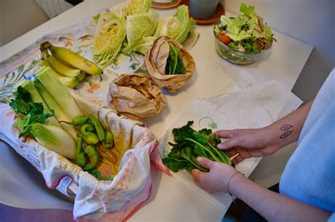 Girl Prepares Vegetables To Be Stored Or Cooked Stock Photo - Download ...
