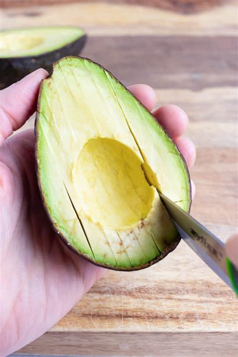 How to Cut an Avocado (Quick &amp; Easy!) - Evolving Table