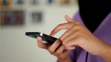 Business woman scrolling smartphone from side 20257530 Stock Video at ...