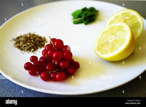 Selection of colourful healthy food on a white plate Stock Photo - Alamy