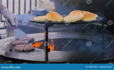 Chef Preparing Burgers at Street Food Festival Stock Image - Image of ...
