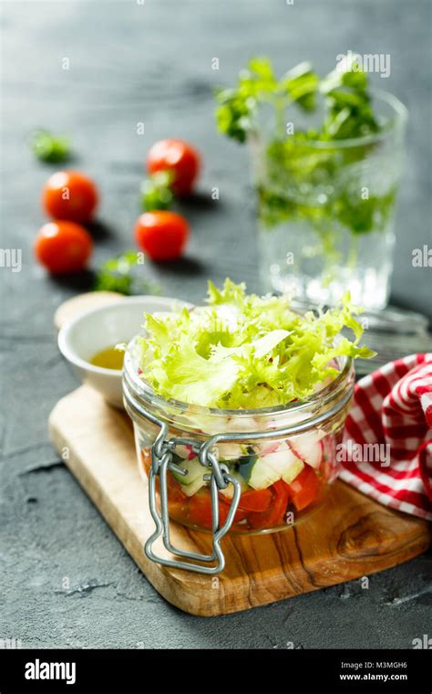 Layered salad in a jar Stock Photo - Alamy