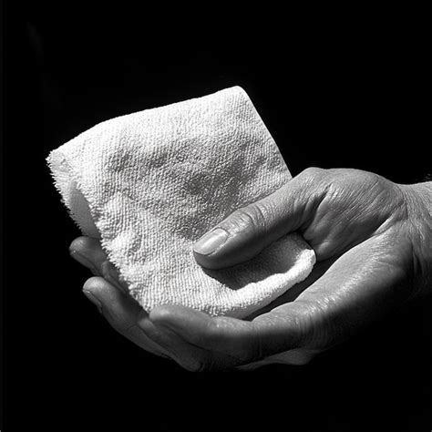 Drying hands with a clean paper towel | Premium AI-generated image