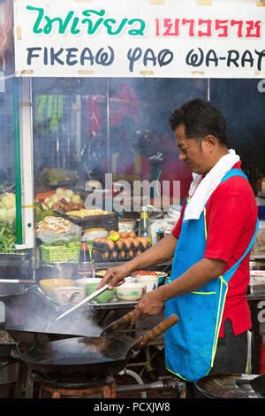 Vegetable wok at a street food stall on the streets of Bangkok ...