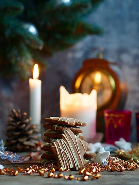 Premium Photo | Lit candles with food on table
