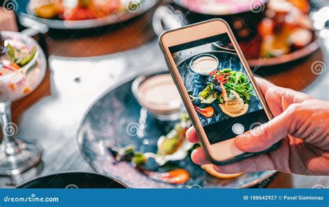 Woman Hand with Smartphone Photographing Food at Restaurant Stock Image ...