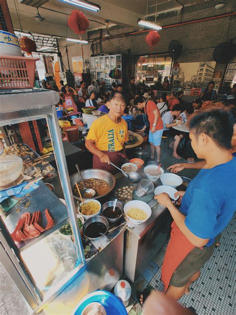 People eating in a Local Street Food Stall · Free Stock Photo