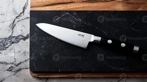 Sharp chef's knife on a cutting board 59292096 Stock Photo at Vecteezy