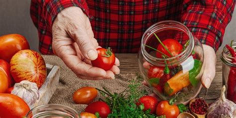 Premium Photo | Preserved season vegetable concept harvest of tomato ...
