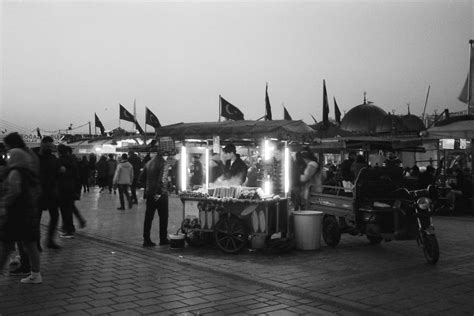 Illuminated Food Stall on City Street · Free Stock Photo