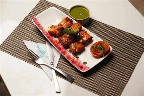 Fancy Dish on Plate with Green Sauce · Free Stock Photo