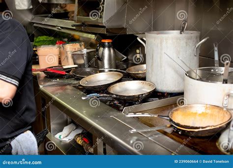 Busy restaurant kitchen stock photo. Image of organized - 239060664