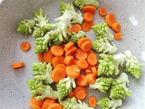 Premium Photo | Close-up of chopped vegetables in container