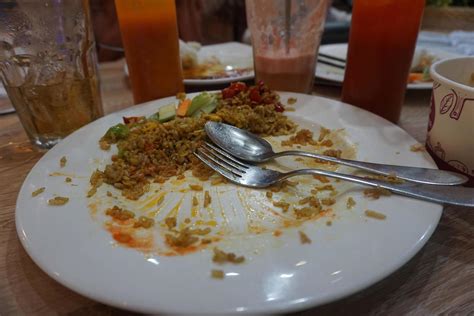 Leftover food on plate 20368677 Stock Photo at Vecteezy