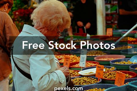 Traveler Interacting With Locals, Trying New Foods, And Experiencing ...