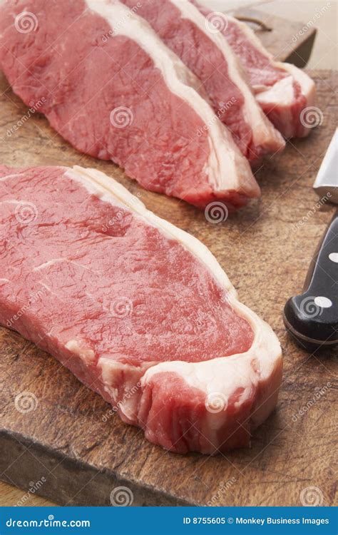 Sliced Steak on Wooden Cutting Board Stock Image - Image of butcher ...