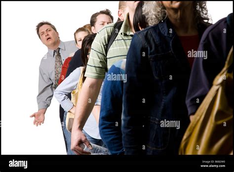 People waiting in line Stock Photo - Alamy