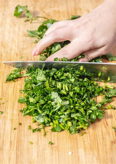 Chopped Parsley is Poured into a Bowl Stock Image - Image of lifestyle ...