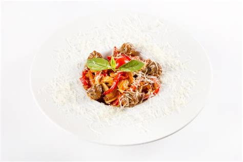 Premium Photo | Meat dish with garnish