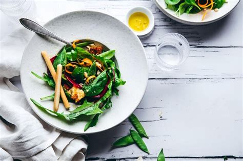 Premium Photo | Preparing healthy green salad