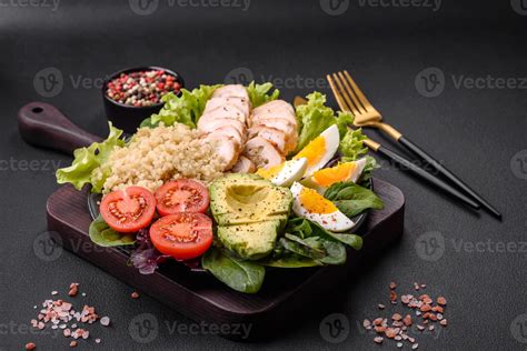 Delicious healthy lunch consisting of chicken, avocado, quinoa, eggs ...