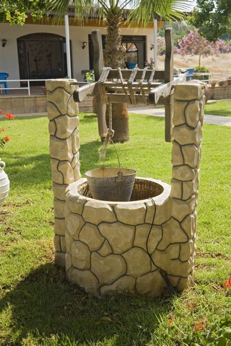 Draw well stock image. Image of grass, village, palm - 23646999